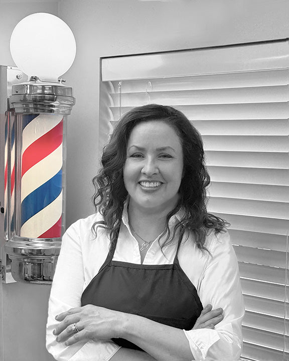Angela expert barber with 30 years of experience. Specializing in flat-top haircuts. 