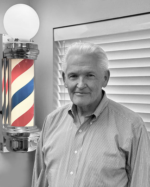Ron the owner of Bullseye Barbershop in Draper, Utah